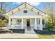 Charming bungalow-style home with inviting front porch and manicured landscaping at 955 Bouldercrest Se Dr, Atlanta, GA 30316