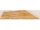 Close-up of hardwood flooring with white baseboards and trim in a well-lit room at 955 Bouldercrest Se Dr, Atlanta, GA 30316