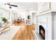 Spacious living room with fireplace flowing into the dining and kitchen areas at 955 Bouldercrest Se Dr, Atlanta, GA 30316