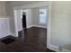 Open dining room features modern flooring and light fixture, perfect for Gathering meals and gatherings at 1012 Burns Dr, Atlanta, GA 30310