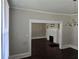 Spacious living room provides an open layout connecting to a dining area, filled with natural light at 1012 Burns Dr, Atlanta, GA 30310