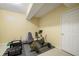 The basement features workout equipment for exercise enthusiasts to work up a sweat at 1395 Brisbane Dr, Dacula, GA 30019
