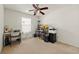 Bedroom with desk, chair, computer, printer and office supplies at 1395 Brisbane Dr, Dacula, GA 30019