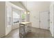 Bright breakfast nook with a small table, chair, and windows at 1395 Brisbane Dr, Dacula, GA 30019