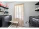Practical laundry room with modern washer and dryer, storage shelves, and natural light at 1755 Fairburn Sw Rd, Atlanta, GA 30331