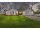 Charming single-story home with well-manicured lawn, two-car garage, and inviting curb appeal at 5720 Crow Dr, Cumming, GA 30041