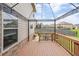 Cozy back deck with outdoor seating, perfect for relaxing or entertaining guests at 8097 White Oak Loop, Lithonia, GA 30038