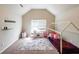 bedroom featuring vaulted ceilings, play furniture, and carpeted floors at 8097 White Oak Loop, Lithonia, GA 30038