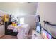 Bedroom with decor, desk, and vaulted ceiling at 8097 White Oak Loop, Lithonia, GA 30038
