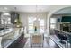 Bright dining area with modern furnishings and hardwood floors, perfect for Gathering meals at 8097 White Oak Loop, Lithonia, GA 30038