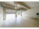 Spacious two-car garage with epoxy floors and electric car charger at 8097 White Oak Loop, Lithonia, GA 30038