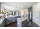 Spacious kitchen with a large island and stainless steel refrigerator at 8097 White Oak Loop, Lithonia, GA 30038