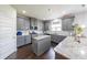 Well-equipped kitchen with a large island, granite counters, and stainless steel appliances at 8097 White Oak Loop, Lithonia, GA 30038