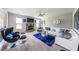 Stylish living room with a fireplace, modern furniture, and ample natural light at 8097 White Oak Loop, Lithonia, GA 30038