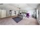 Spacious main bedroom with a vaulted ceiling, sitting area, and ensuite bath at 8097 White Oak Loop, Lithonia, GA 30038