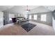 Spacious main bedroom with a trey ceiling, lots of natural light, and stylish decor at 8097 White Oak Loop, Lithonia, GA 30038
