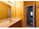 Bathroom with tiled floors and large vanity at 1250 Great Oaks Se Dr, Conyers, GA 30013