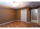 Bedroom featuring laminate flooring and closet at 1250 Great Oaks Se Dr, Conyers, GA 30013
