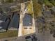 A detailed aerial view showcases the house's layout and location within a leafy neighborhood at 1569 Montreat Sw Ave, Atlanta, GA 30311