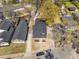 Overhead view shows home's placement on the lot, with a long driveway and proximity to neighboring houses and trees at 1569 Montreat Sw Ave, Atlanta, GA 30311
