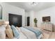Comfortable bedroom with a woven dresser and beachy decor at 1569 Montreat Sw Ave, Atlanta, GA 30311
