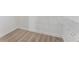Walk-in closet features hardwood floors and metal shelving for optimal storage at 1569 Montreat Sw Ave, Atlanta, GA 30311