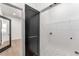 Clean laundry room featuring hex tile and a wire rack for storage at 1569 Montreat Sw Ave, Atlanta, GA 30311