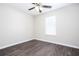 A comfortable bedroom with a ceiling fan and natural light from the window at 4502 Lake Park Dr, Acworth, GA 30101