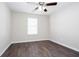A serene bedroom with a ceiling fan and window, offering a bright and airy feel at 4502 Lake Park Dr, Acworth, GA 30101