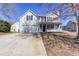 Charming two-story home with a welcoming front porch, two-car garage, and well-maintained lawn at 4502 Lake Park Dr, Acworth, GA 30101