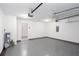 Clean two-car garage with epoxy flooring offers plenty of room for parking and storage, with access to indoors at 4502 Lake Park Dr, Acworth, GA 30101