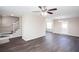 Spacious living room with adjacent staircase and modern flooring for comfort and style at 4502 Lake Park Dr, Acworth, GA 30101