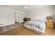 Bedroom features natural light, desk, and wooden floors at 877 Old Farm Walk, Marietta, GA 30066