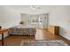 Bedroom boasts natural light, wood floors, ceiling fan, and spacious layout at 877 Old Farm Walk, Marietta, GA 30066