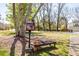 View of a community library box with bench seating near the road at 877 Old Farm Walk, Marietta, GA 30066