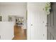 Bright and inviting foyer showcasing hardwood floors and a glimpse of the dining area at 877 Old Farm Walk, Marietta, GA 30066