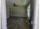 Inviting living room with new floors and lots of natural light from large windows at 2468 Baxter Sw Rd, Atlanta, GA 30315