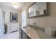 Stylish bathroom with marble countertops, white cabinetry, and modern fixtures at 5780 Riverwood Dr, Sandy Springs, GA 30328