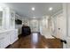 Spacious bathroom with a glass-walled shower, sleek vanity, and hardwood floors at 5780 Riverwood Dr, Sandy Springs, GA 30328