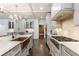 Well-equipped kitchen featuring modern appliances, a large island, and seamless flow to the adjacent living spaces at 5780 Riverwood Dr, Sandy Springs, GA 30328