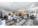 Spacious living room with coffered ceilings, hardwood floors, and an open layout connecting to the gourmet kitchen at 5780 Riverwood Dr, Sandy Springs, GA 30328