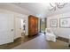 Bright primary bedroom featuring hardwood floors, natural light, and neutral tones at 5780 Riverwood Dr, Sandy Springs, GA 30328