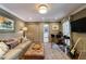 Cozy home office with a couch, desk, warm lighting, and ample storage space at 5780 Riverwood Dr, Sandy Springs, GA 30328