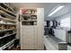 Spacious walk-in closet with custom shelving and organized storage solutions at 5780 Riverwood Dr, Sandy Springs, GA 30328