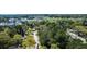 Enjoy this aerial view of a charming neighborhood surrounded by mature trees, offering a peaceful setting at 661 Inglewood Se Dr, Smyrna, GA 30080