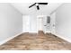 Neutral bedroom with hardwood floors and closet door at 661 Inglewood Se Dr, Smyrna, GA 30080
