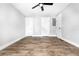 Neutral bedroom with hardwood floors and two doors at 661 Inglewood Se Dr, Smyrna, GA 30080