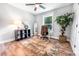 Bright office space with natural light, hardwood floors, and a comfortable work area at 661 Inglewood Se Dr, Smyrna, GA 30080
