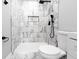 New marble tiled shower features a shower head fixture at 661 Inglewood Se Dr, Smyrna, GA 30080