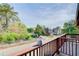 View from wooden balcony showcasing tree-lined street at 561 Formwalt Sw St # 6, Atlanta, GA 30312